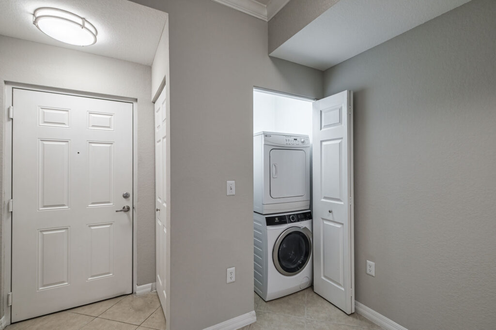 laundry closet with washer and dryer