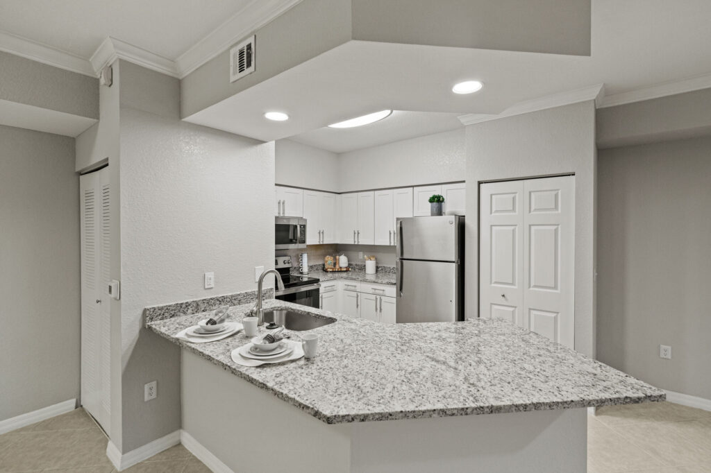 Kitchen with granite counters and stainless steel appliances