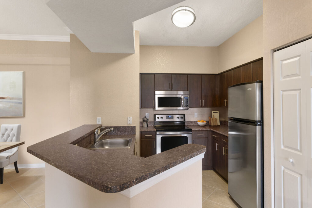 Kitchen with granite counters and stainless steel appliances